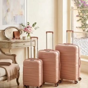 Siri de trois valises tittou incassable et démontable de couleur saumon